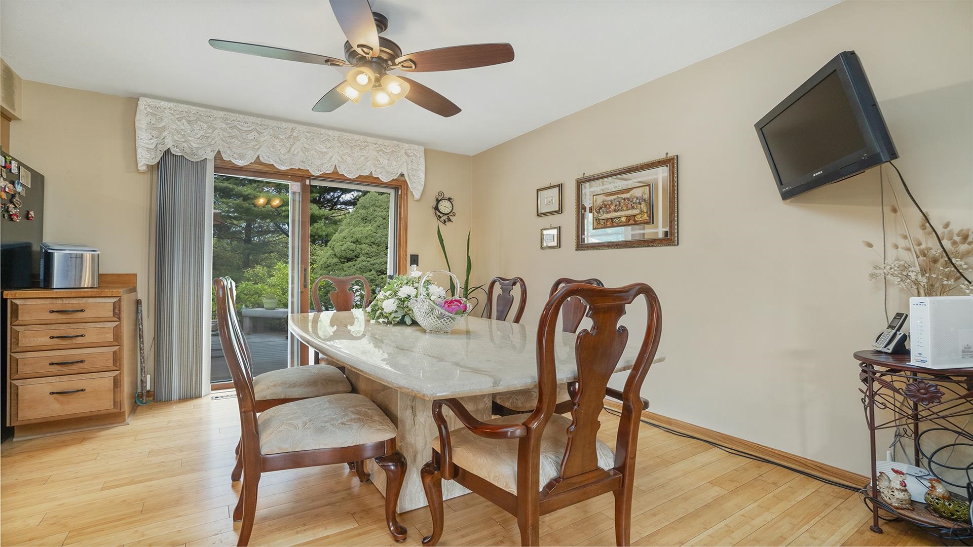 8317 Alan Court Rockford, IL 61108 - Photo 11 of 29 a view of a dining room with furniture window and wooden floor