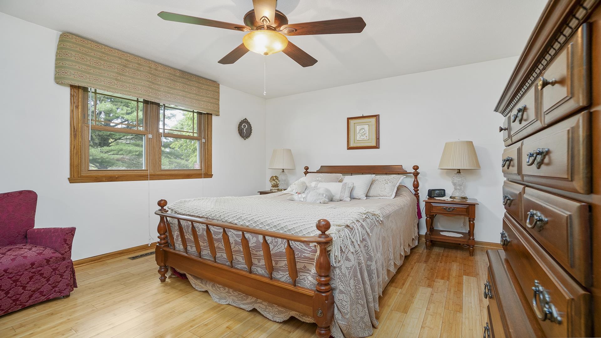 8317 Alan Court Rockford, IL 61108 - Photo 13 of 29 a bed room with a bed and a chair