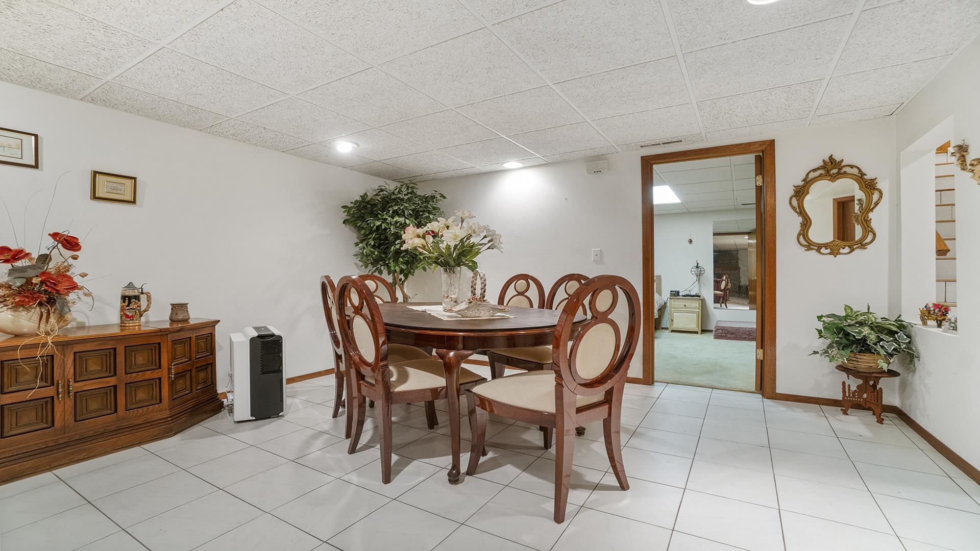 8317 Alan Court Rockford, IL 61108 - Photo 22 of 29 a view of a dining room with furniture and chandelier