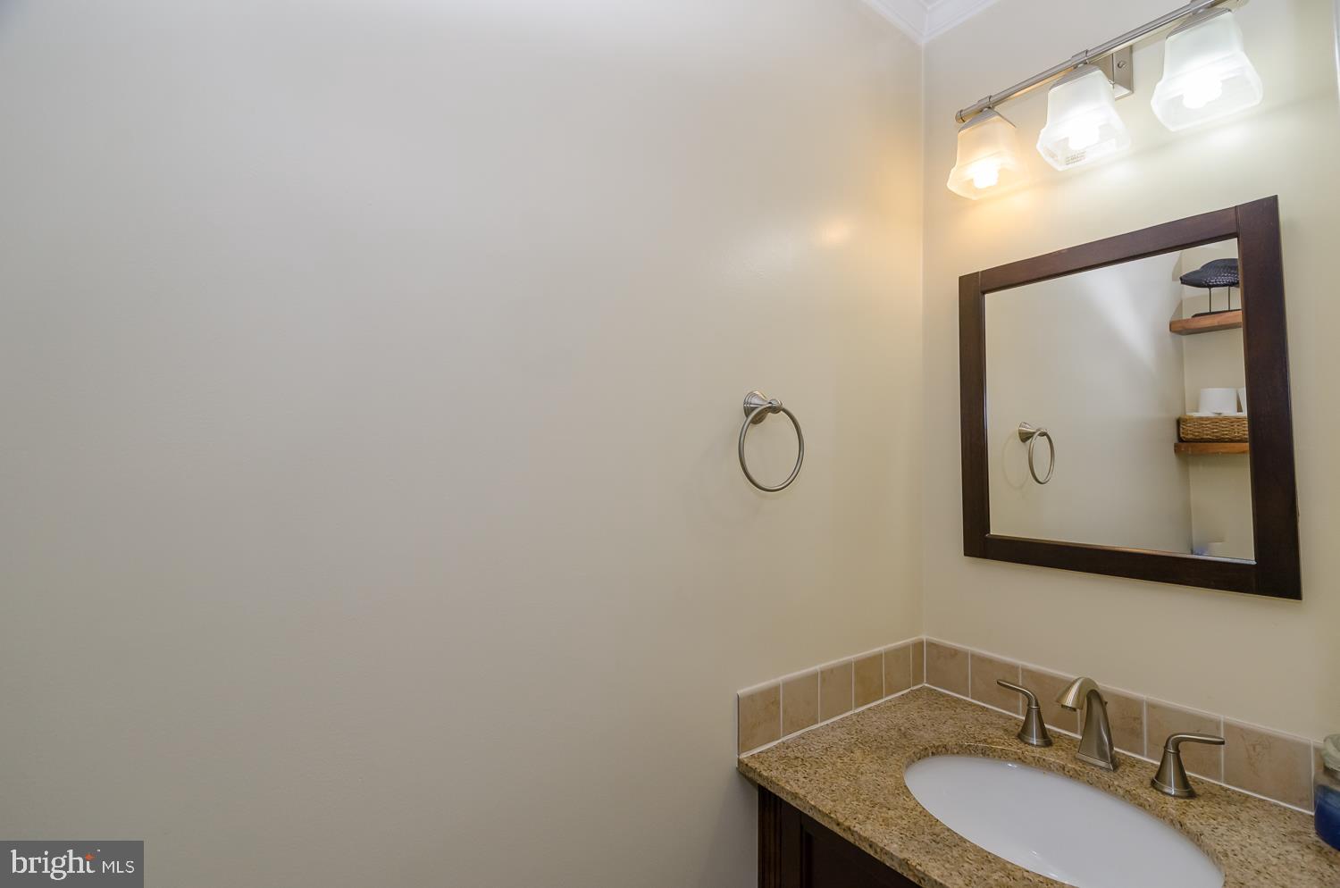 7797 Notley Road Pasadena, MD 21122 - Photo 13 of 30 Half bath on main level
