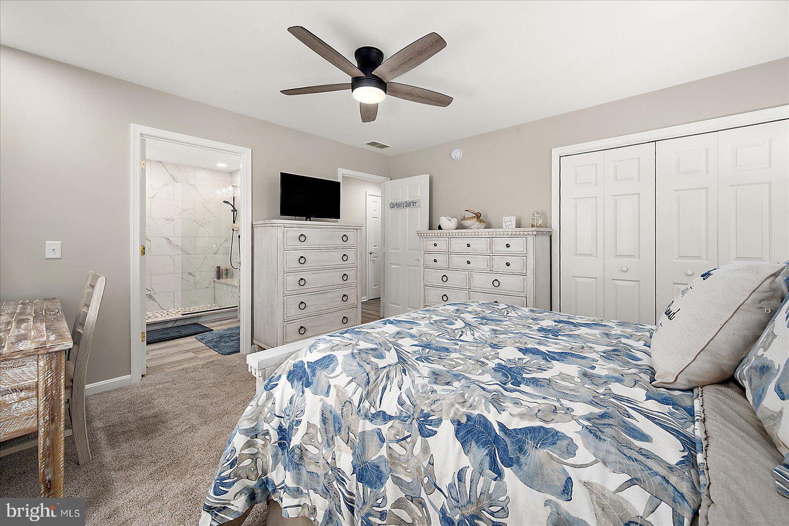 10362 Keyser Point Road Ocean City, MD 21842 - Photo 32 of 51 Serene bedroom with modern touches.