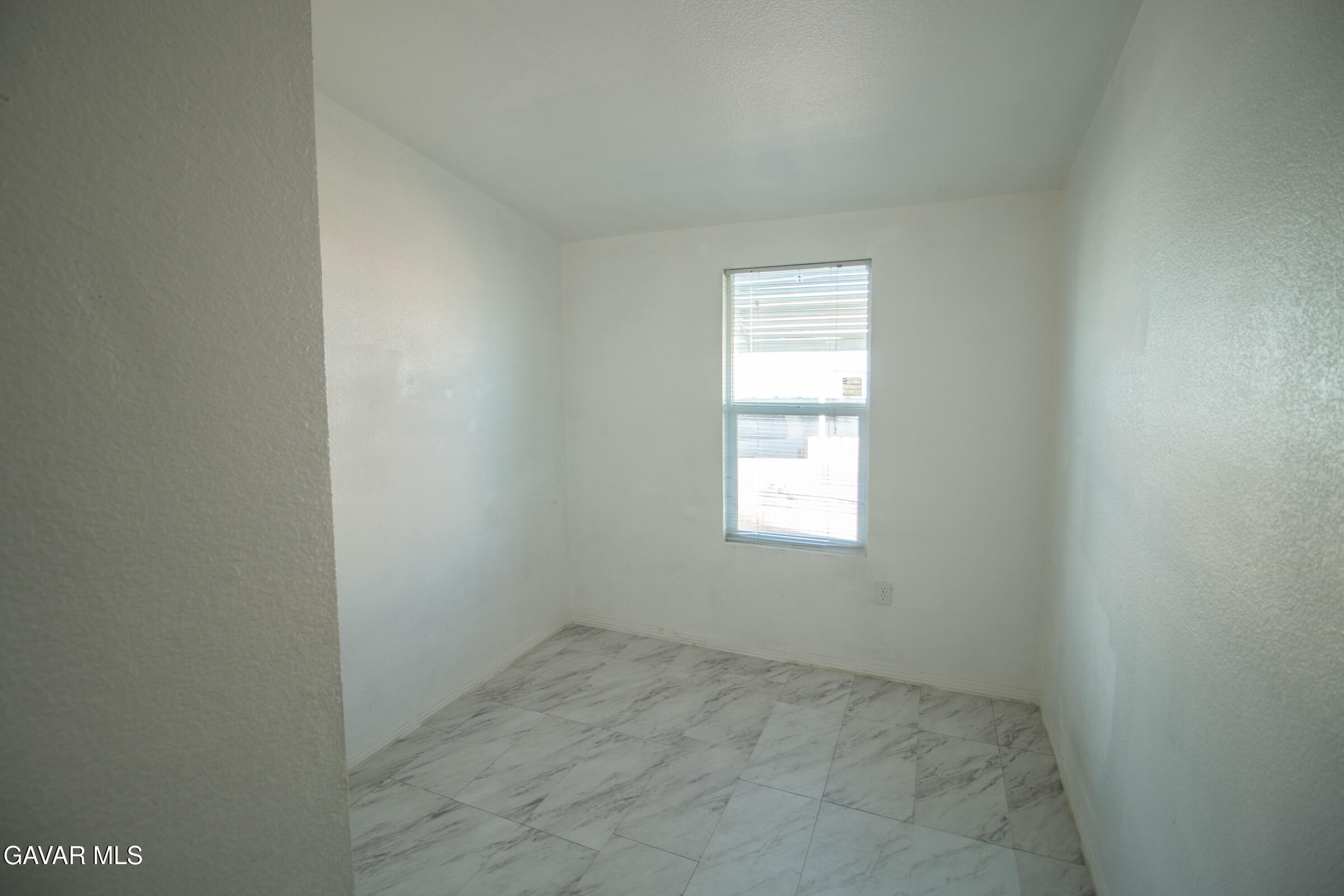 4444 Avenue R Palmdale, CA 93552 - Photo 16 of 17 an empty room with a window