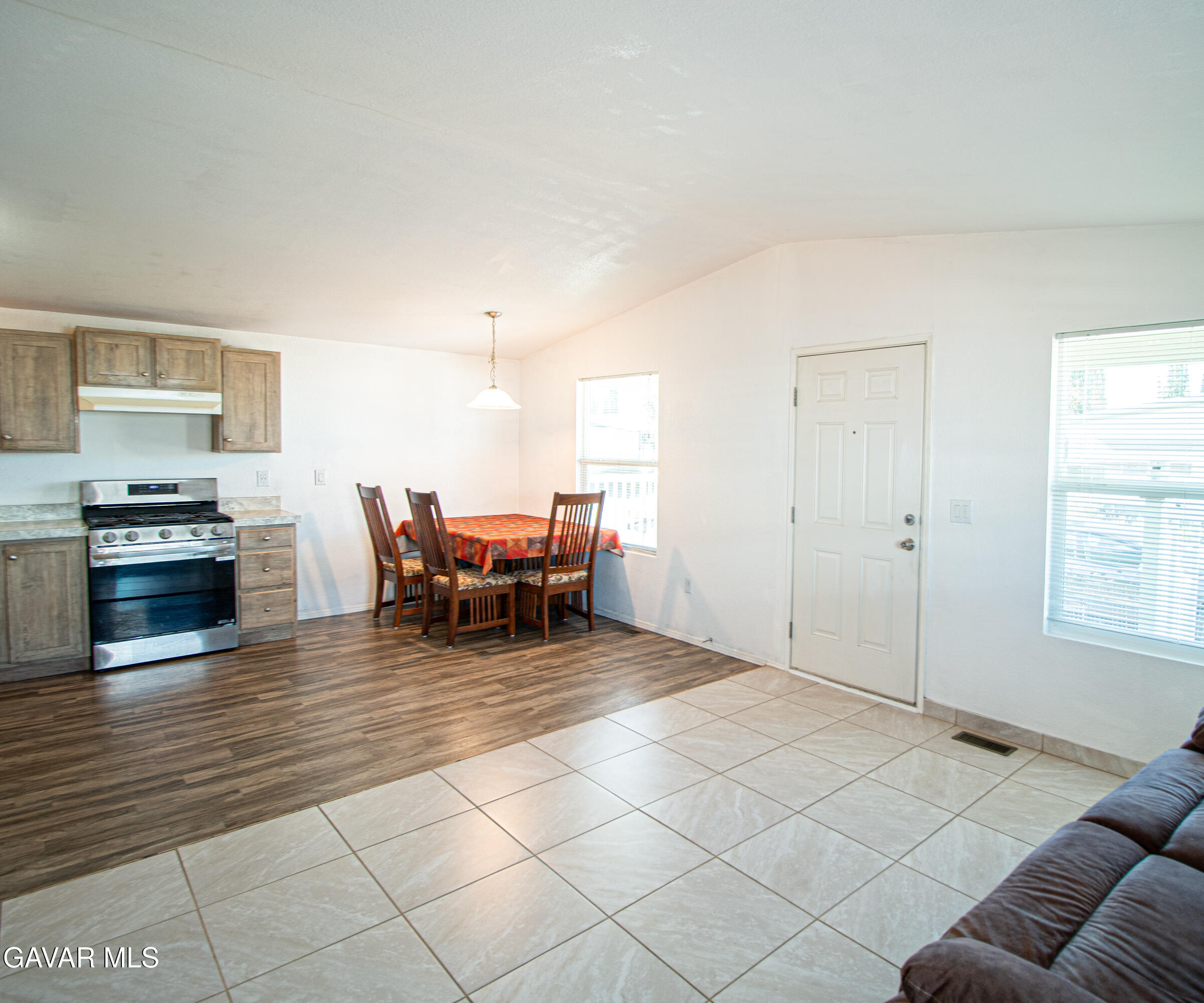 4444 Avenue R Palmdale, CA 93552 - Photo 9 of 17 a living room with furniture and a fireplace