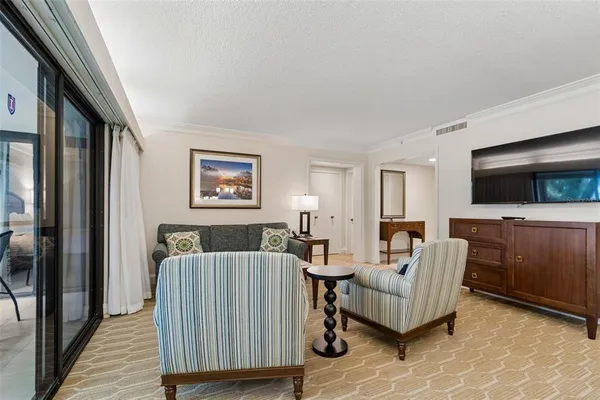 a bedroom with a bed and a mirror