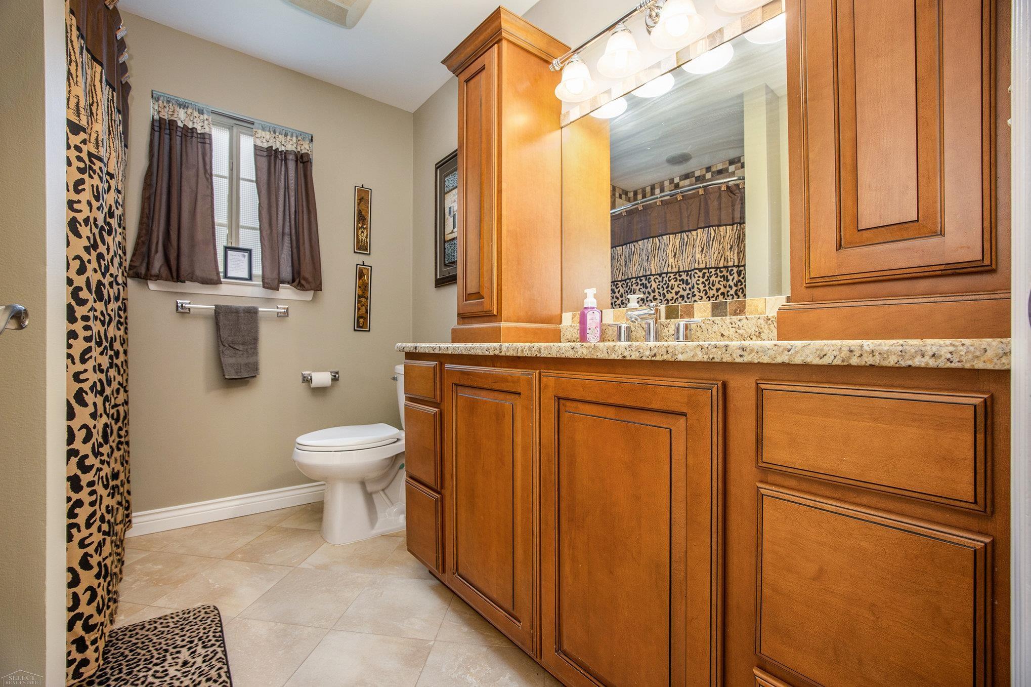 411 Ewell Street Romeo, MI 48065 - Photo 9 of 17 Updated bath with lots of storage