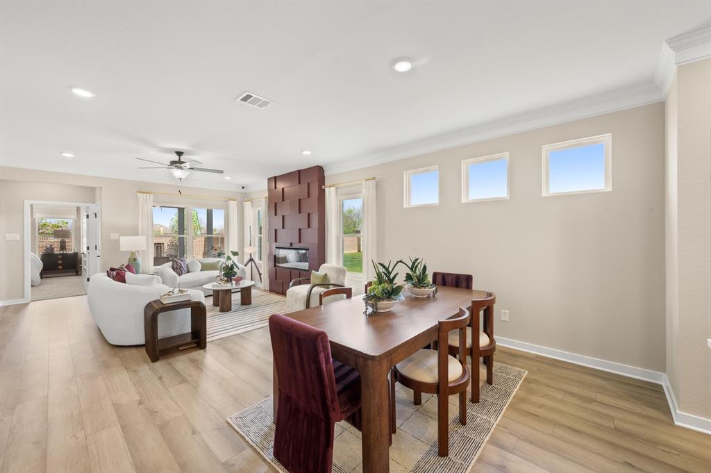 4328 Brayfield Road Fort Worth, TX 76036 - Photo 9 of 26 The Oakshire II- Dining Area into the Family Room