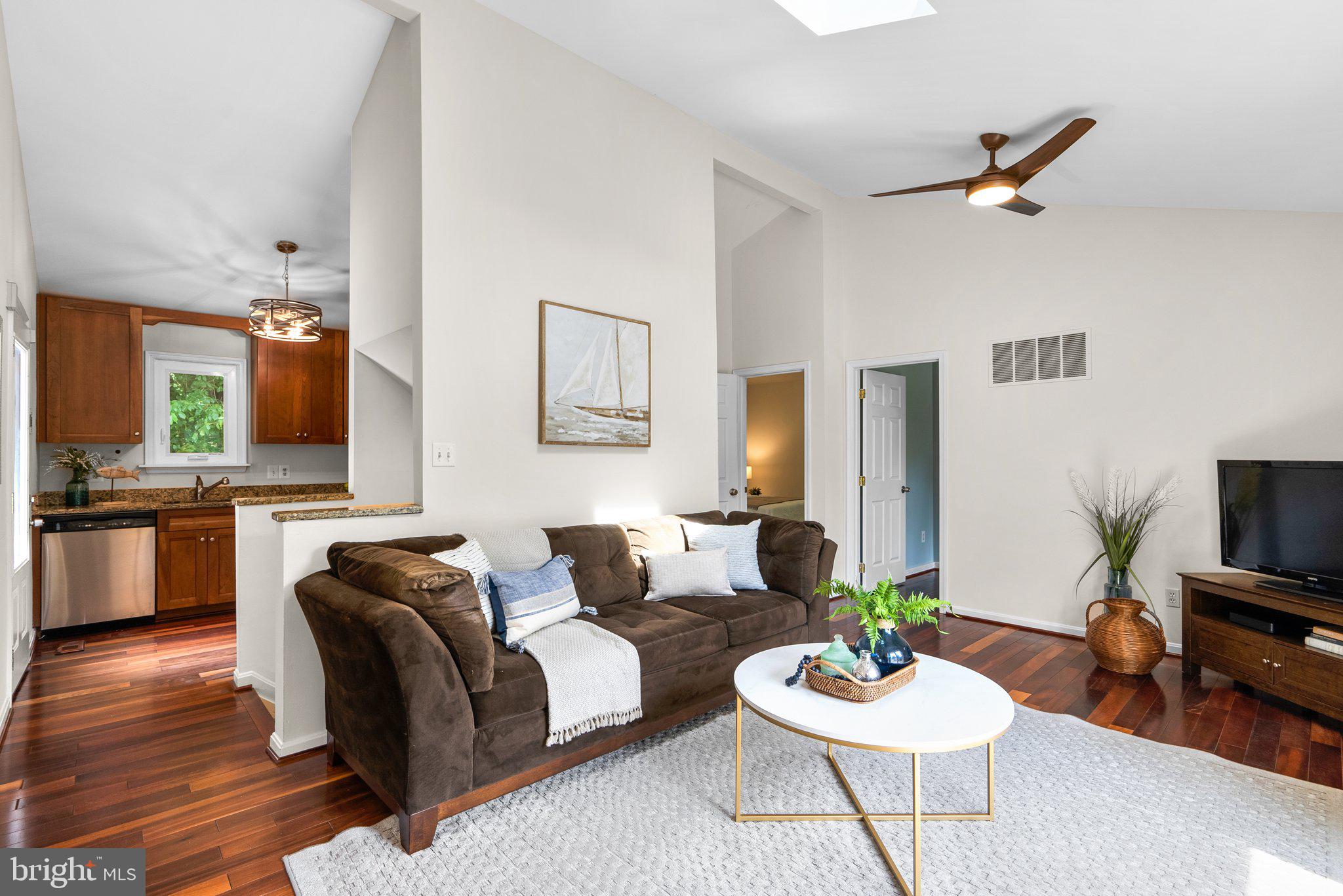 511 Forest Road Riva, MD 21140 - Photo 14 of 44 Living room with vaulted ceiling, wood floors