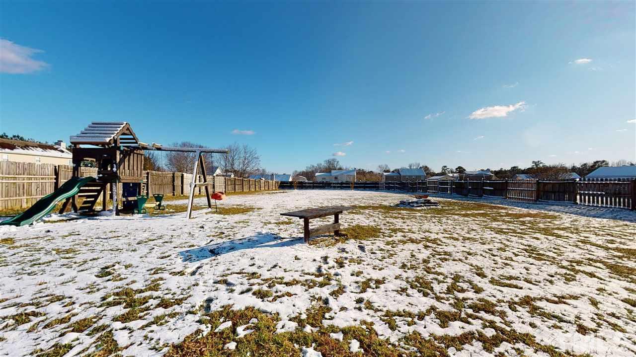 1405 Harvey Johnson Road Raleigh, NC 27603 - Photo 24 of 30 Huge fenced back yard! with outdoor play set