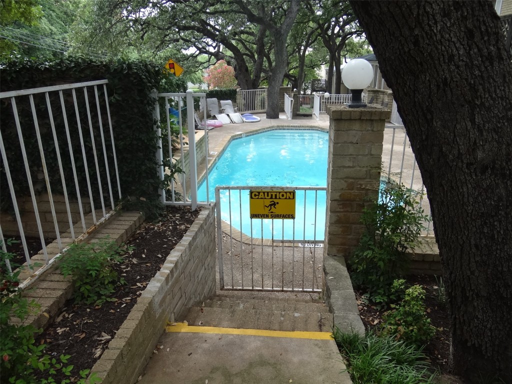 912 East 32nd Street, Unit 103 Austin, TX 78705 - Photo 3 of 27 a view of balcony with wooden floor