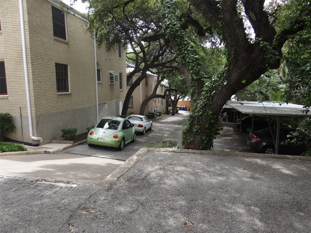 912 East 32nd Street, Unit 103 Austin, TX 78705 - Photo 4 of 27 a view of a chair and table in the house