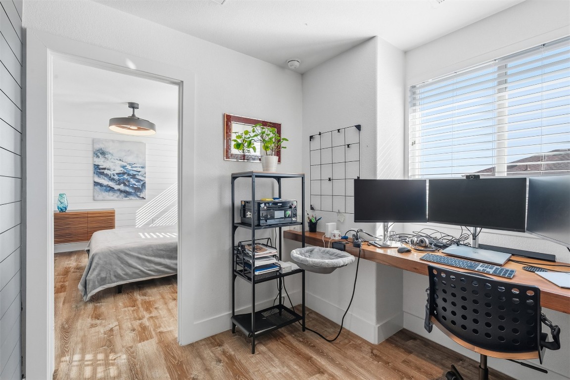 404 Cane River Road Pflugerville, TX 78660 - Photo 12 of 24 a workspace with furniture and window