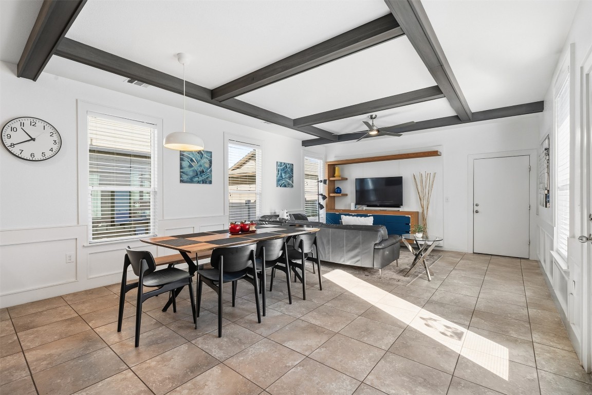 404 Cane River Road Pflugerville, TX 78660 - Photo 6 of 24 a view of a dining room with furniture and a window
