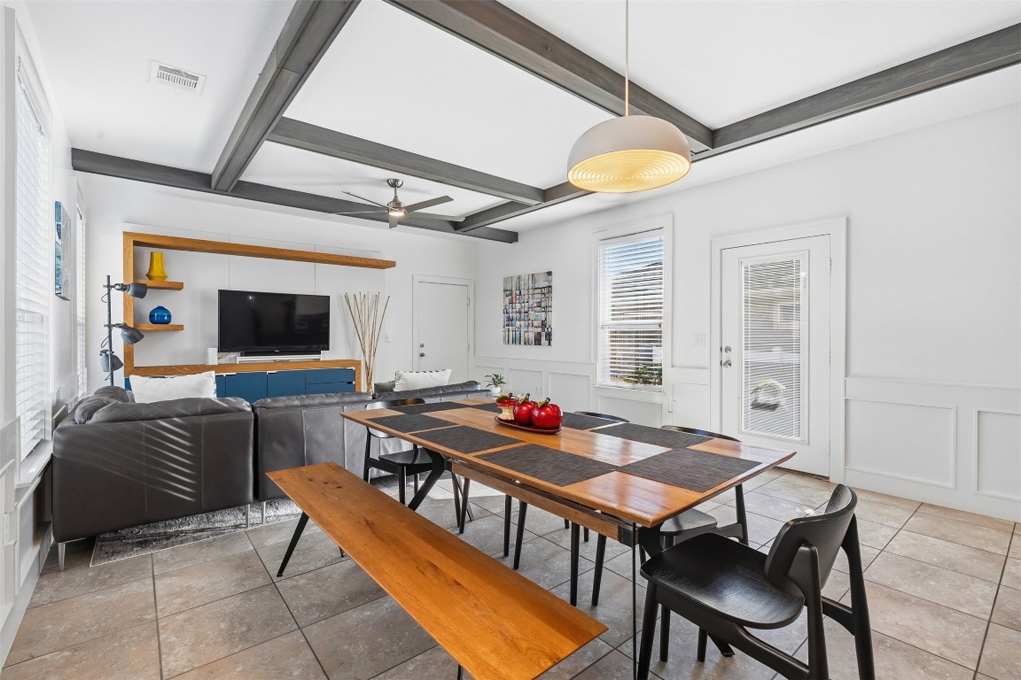 404 Cane River Road Pflugerville, TX 78660 - Photo 7 of 24 a dining room with furniture and wooden floor