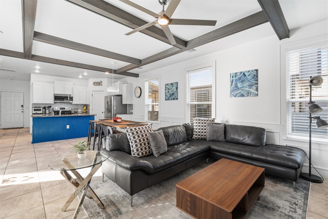 404 Cane River Road Pflugerville, TX 78660 - Photo 9 of 24 a living room with furniture and a couch
