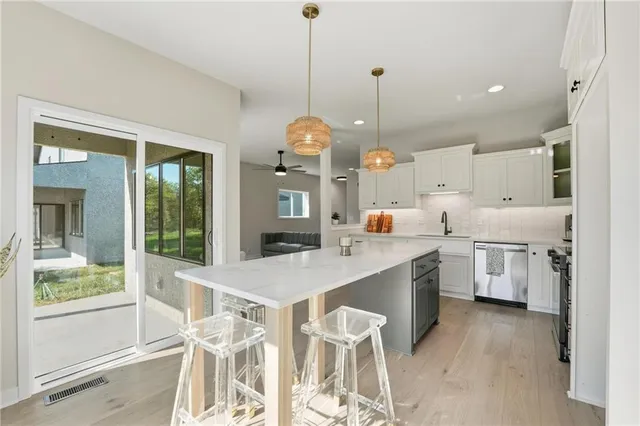 $350,000 | 213 Northwest Orchard Street, Lee's Summit, MO 64063