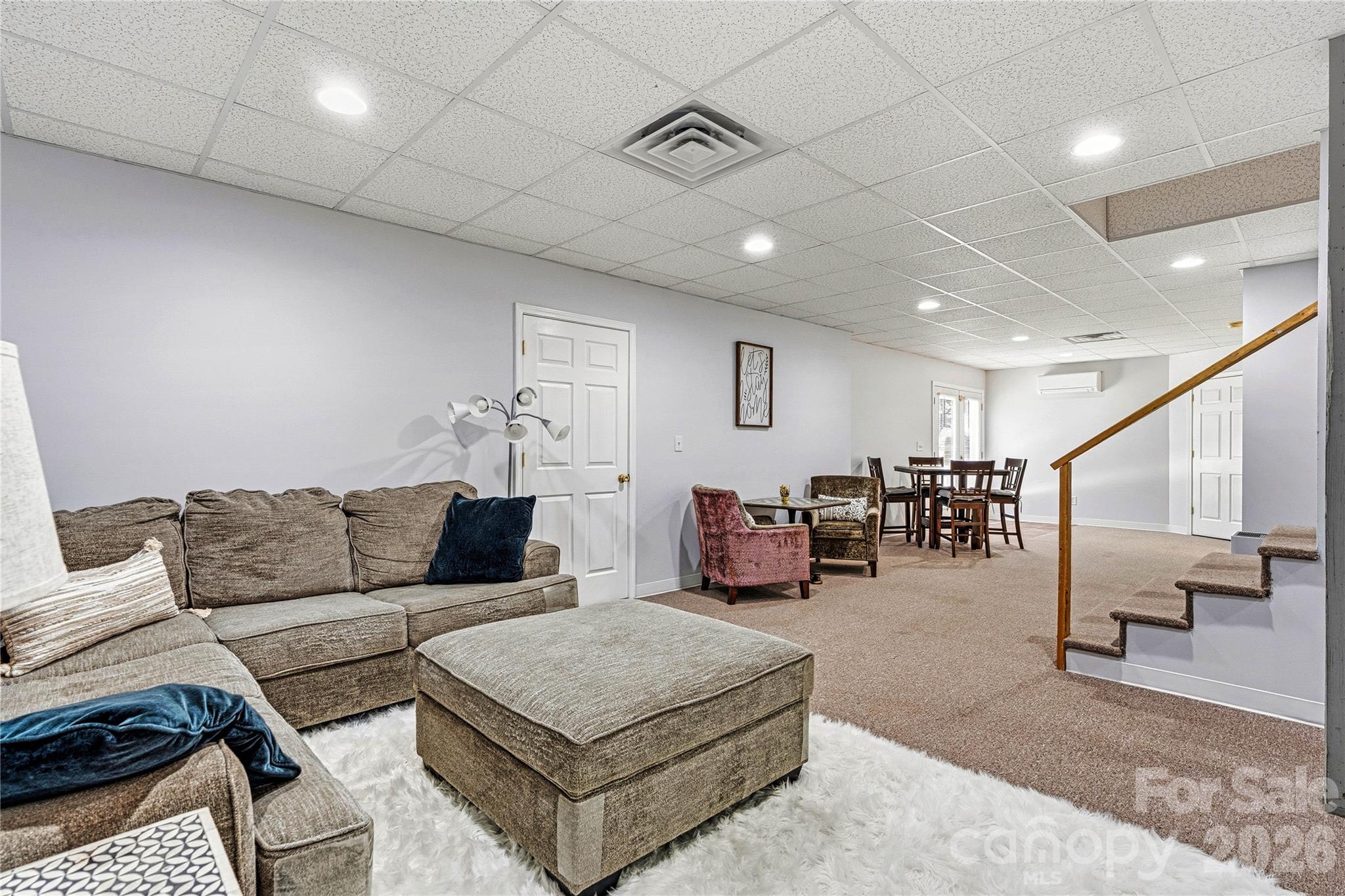 1606 High Ridge Drive Stanley, NC 28164 - Photo 30 of 44 a living room with furniture and wooden floor