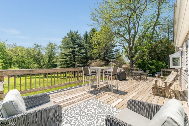 14 Lexington Road Annandale, NJ 08801 - Photo 35 of 47 a view of a patio with couches chairs and wooden floor