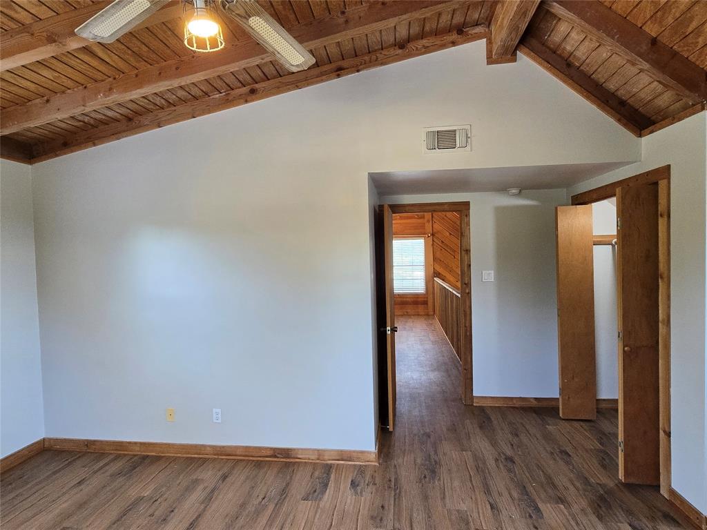 3505 Farmer Road Azle, TX 76020 - Photo 26 of 40 Entry to upstairs bedroom has a lighted closet.