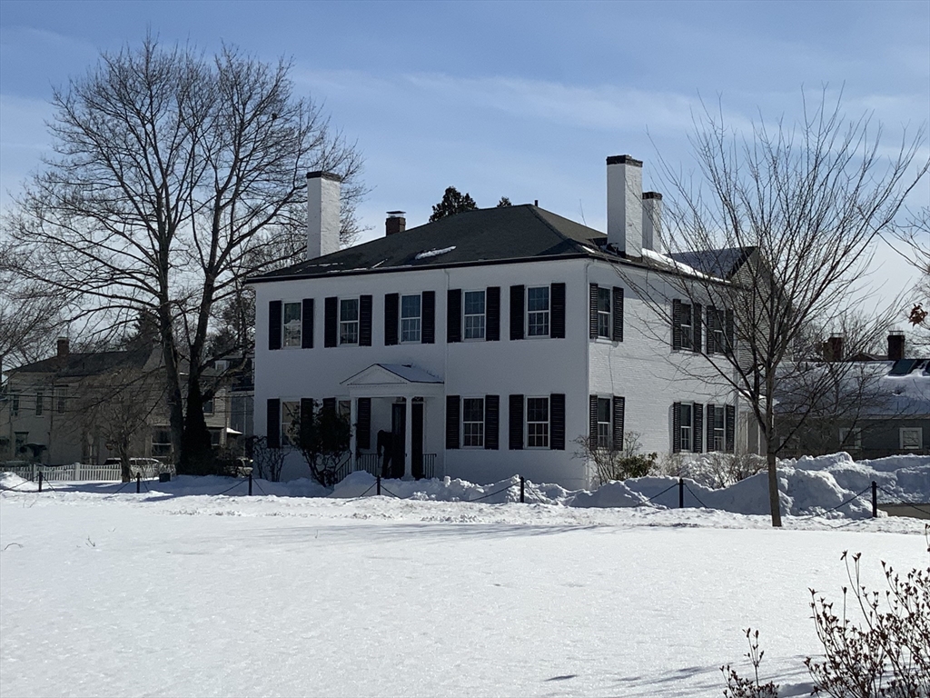 660 High Street Dedham, MA 02026 - Photo 2 of 25 a front view of a building with a yard
