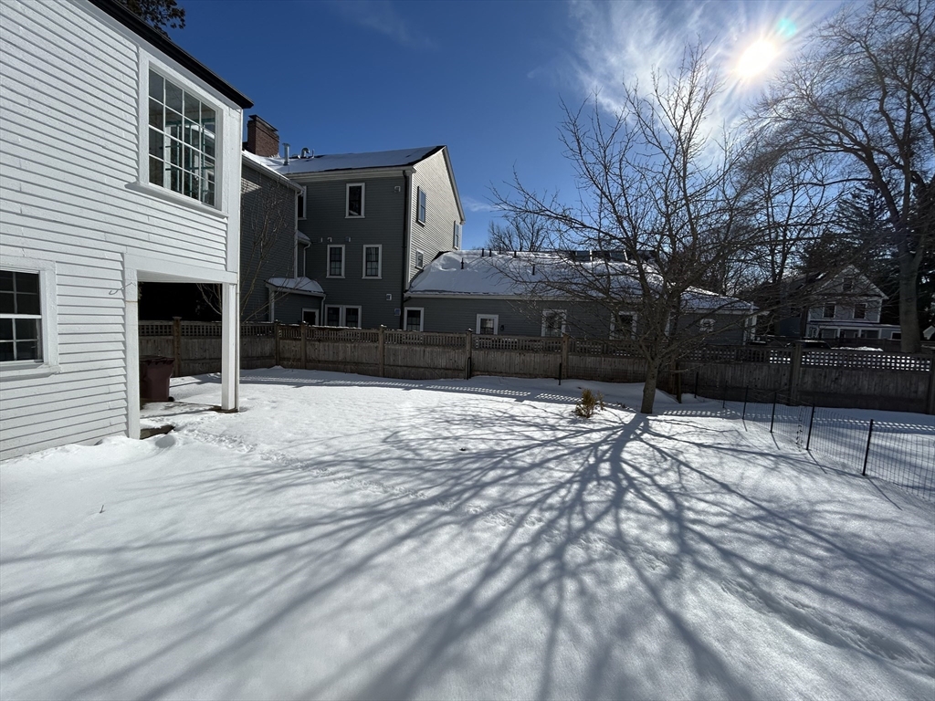 660 High Street Dedham, MA 02026 - Photo 24 of 25 a view of a house with a yard