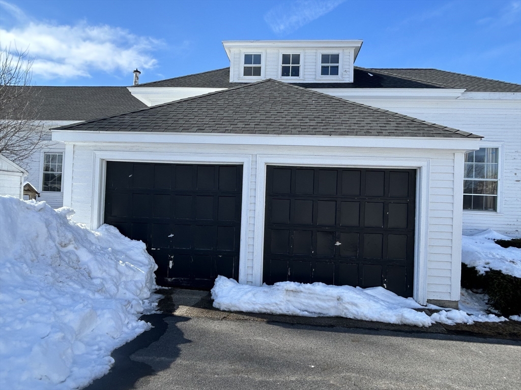 660 High Street Dedham, MA 02026 - Photo 5 of 25 a bedroom with a bed and a window