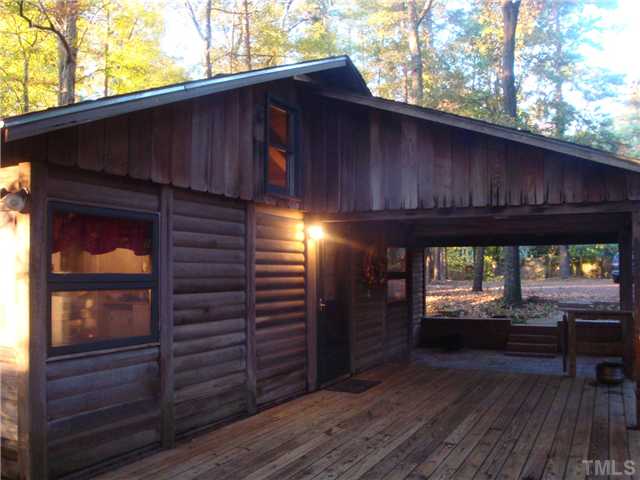 7120 Ebenezer Church Road Raleigh, NC 27612 - Photo 1 of 12 Front entrance to the log cabin