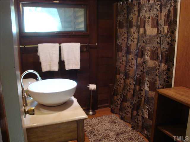 7120 Ebenezer Church Road Raleigh, NC 27612 - Photo 6 of 12 Bath has tub/shower combination