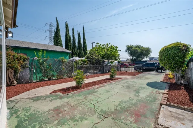 a view of a backyard with plants