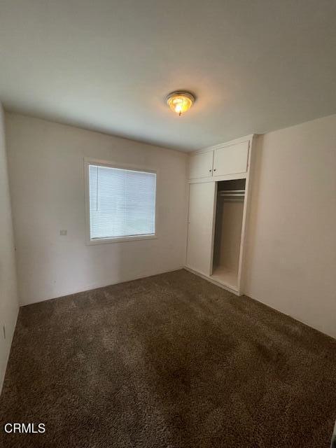 818 Palm Drive, Unit C Oxnard, CA 93030 - Photo 9 of 11 a view of an empty room with a window