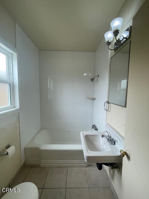818 Palm Drive, Unit C Oxnard, CA 93030 - Photo 10 of 11 a bathroom with a sink a toilet and shower