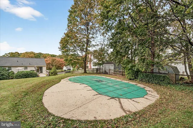 a view of a backyard with a garden