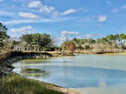 a view of swimming pool and lake