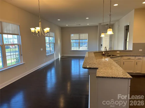 a bathroom with sink and mirror