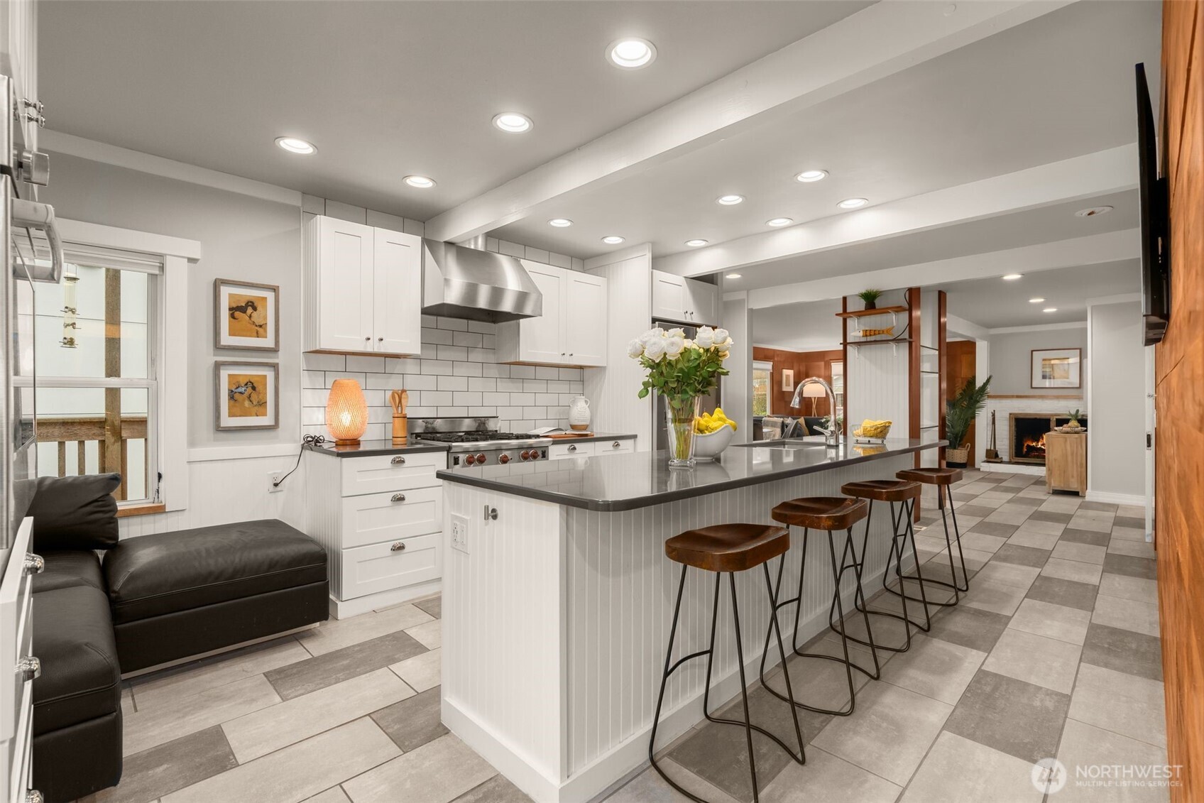 4123 Southwest Rose Street Seattle, WA 98136 - Photo 11 of 32 a kitchen with stainless steel appliances granite countertop a sink and a refrigerator