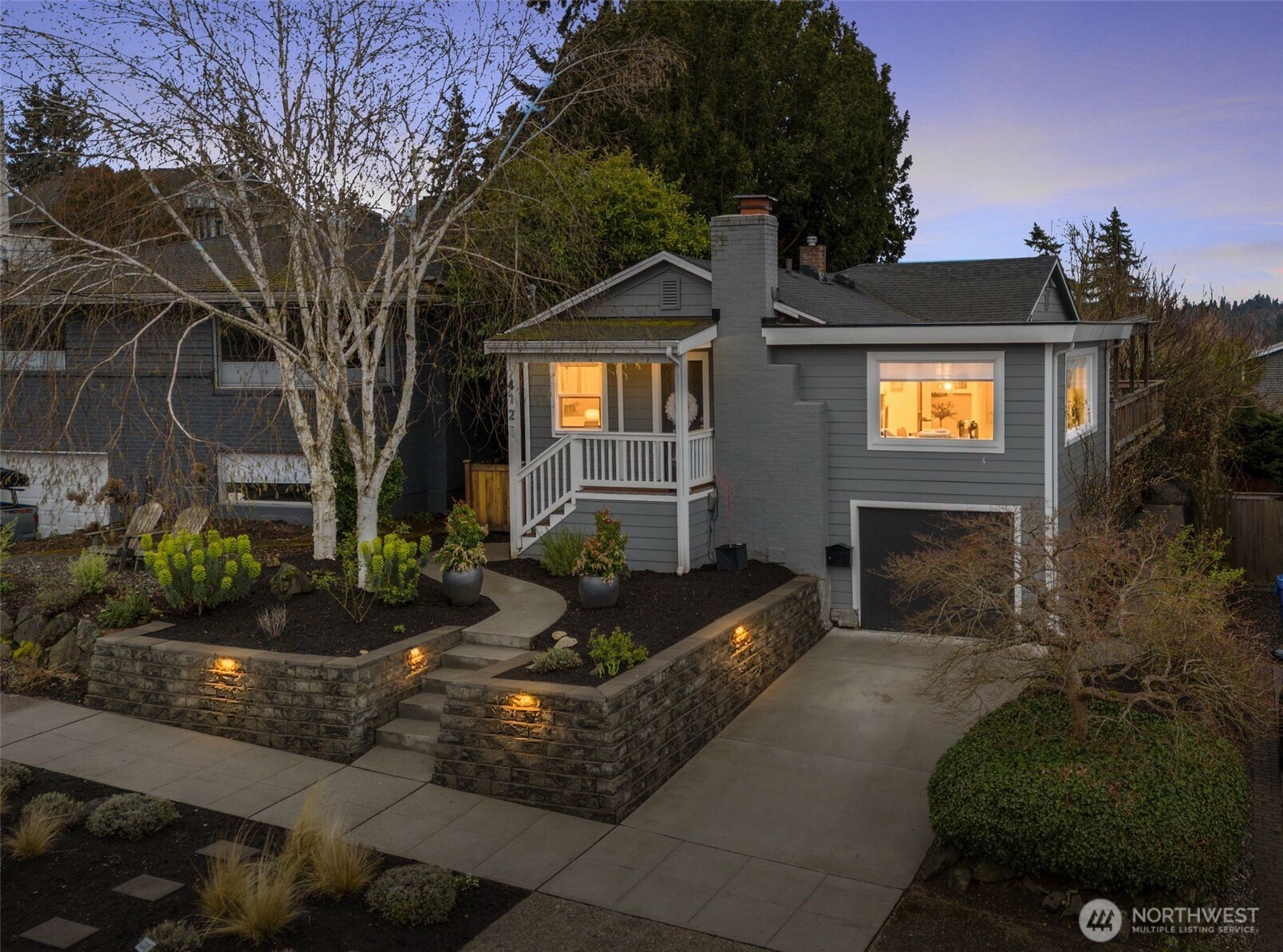 4123 Southwest Rose Street Seattle, WA 98136 - Photo 2 of 32 a front view of a house with yard and parking