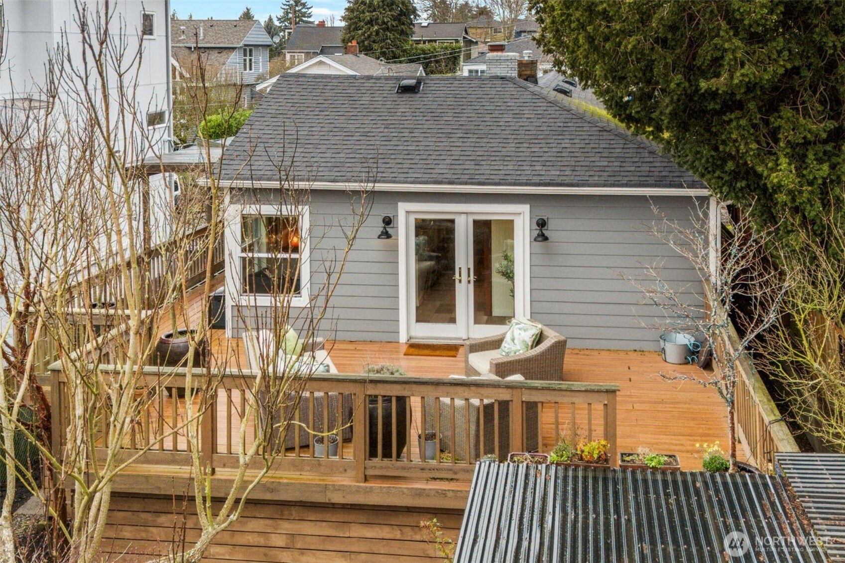 4123 Southwest Rose Street Seattle, WA 98136 - Photo 26 of 32 a view of a house with a patio