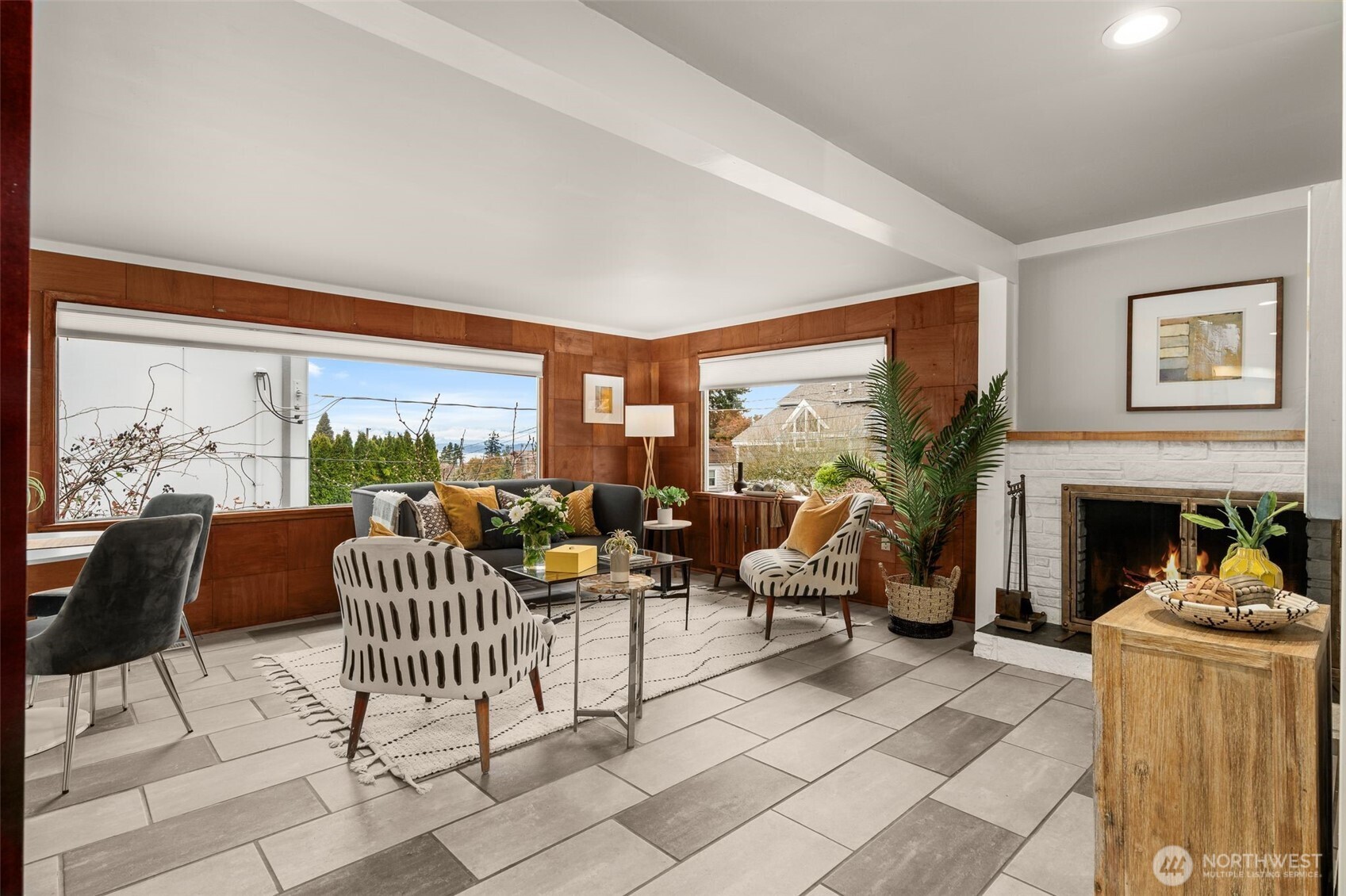 4123 Southwest Rose Street Seattle, WA 98136 - Photo 7 of 32 a living room with furniture and a floor to ceiling window