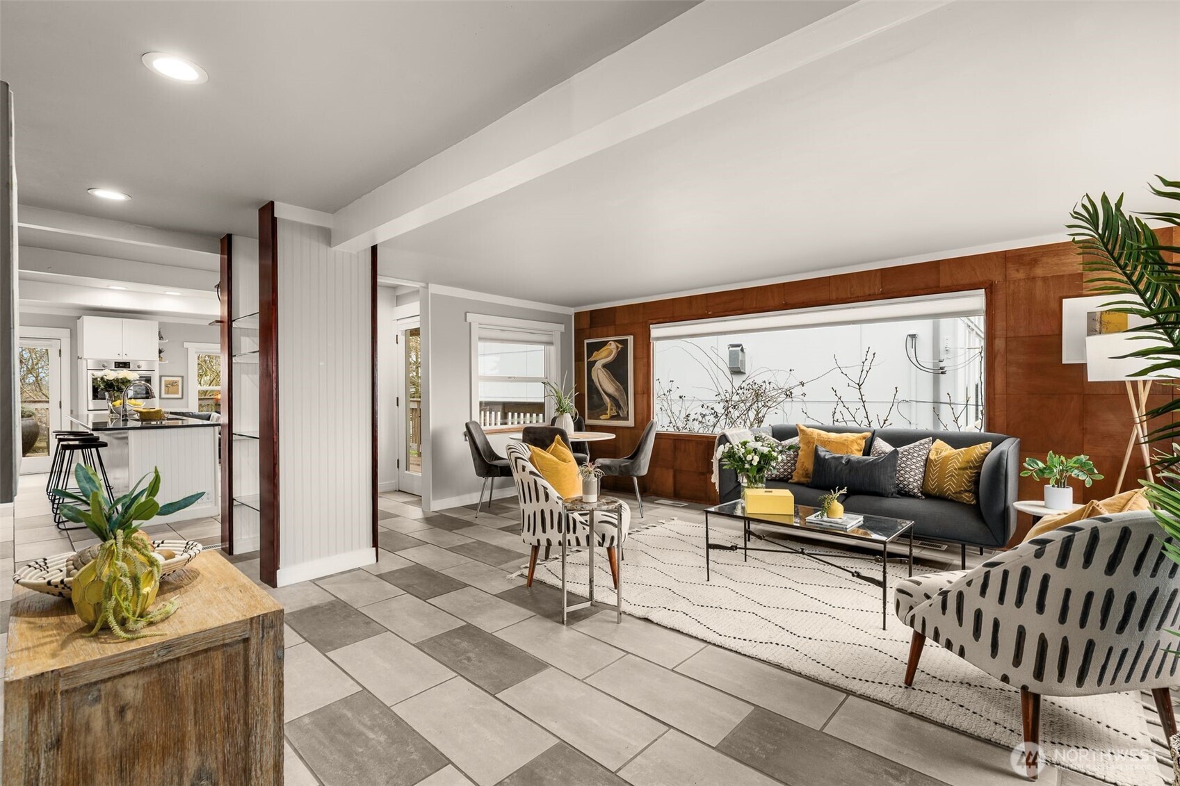 4123 Southwest Rose Street Seattle, WA 98136 - Photo 9 of 32 a living room with patio furniture and a large window