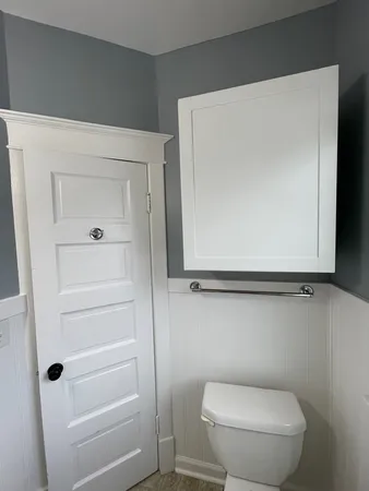a bathroom with a toilet