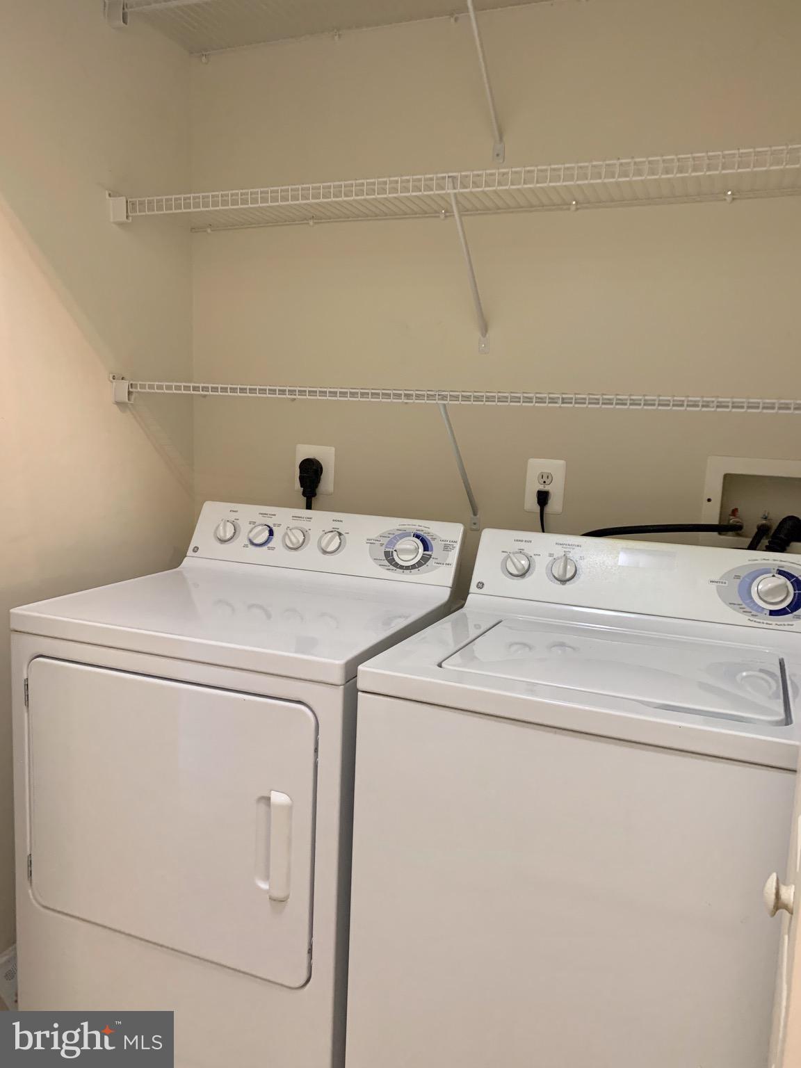 12001 Market Street, Unit 261 Reston, VA 20190 - Photo 17 of 24 full-size washer dryer in unit