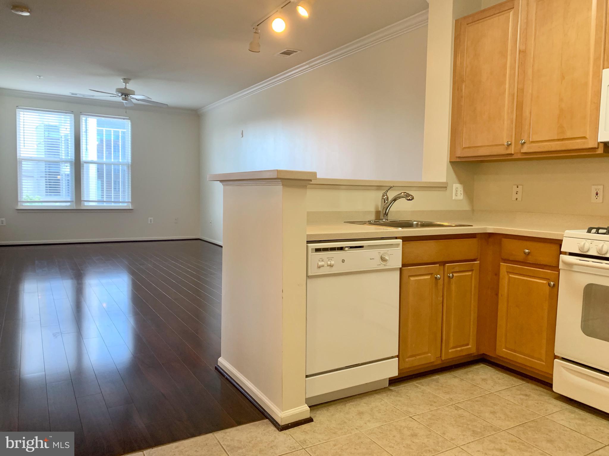 12001 Market Street, Unit 261 Reston, VA 20190 - Photo 6 of 24 Ceramic floor in entry and kitchen