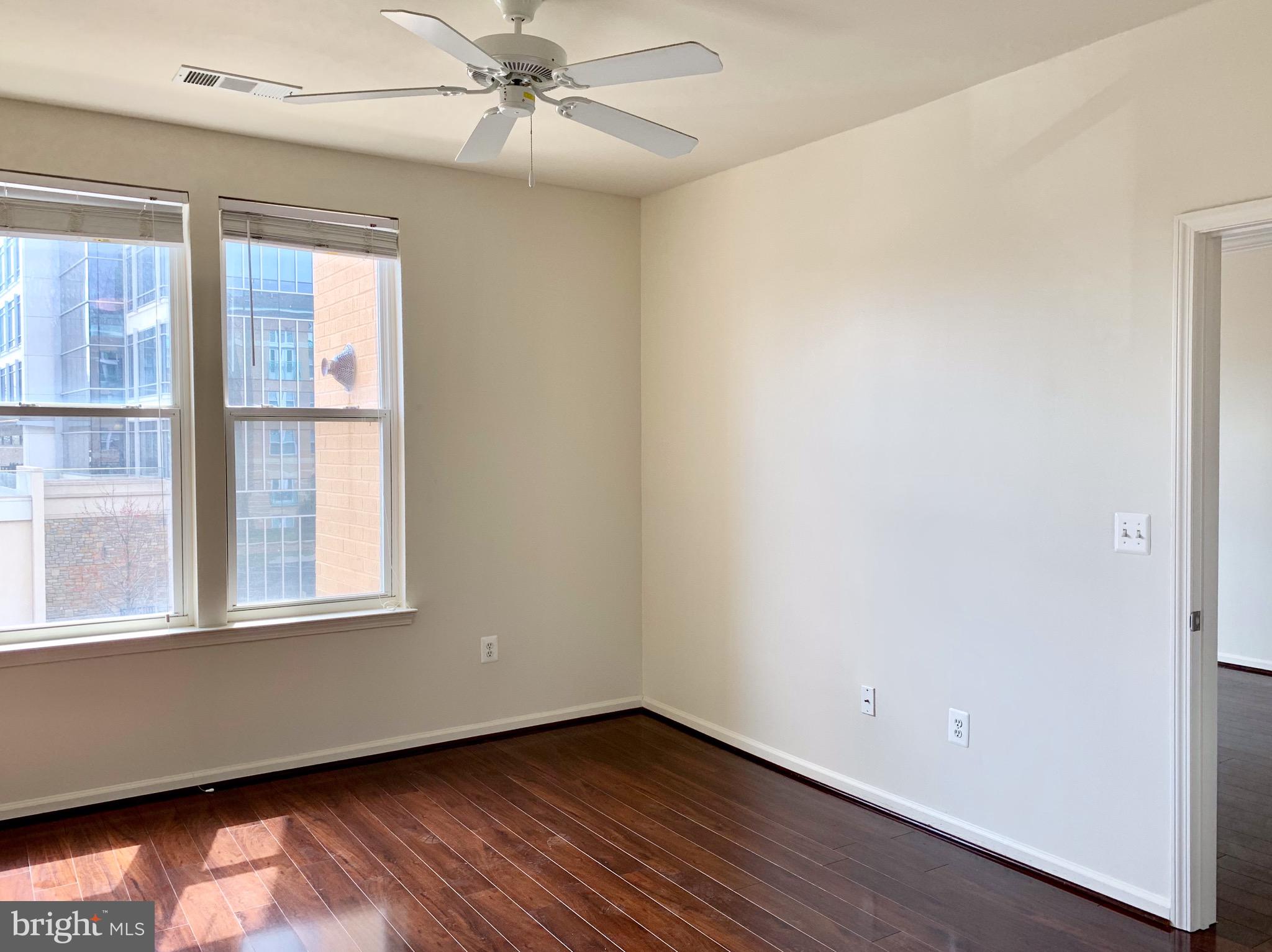 12001 Market Street, Unit 261 Reston, VA 20190 - Photo 7 of 24 large bedroom with ceiling fan