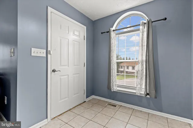 a view of an empty room with window