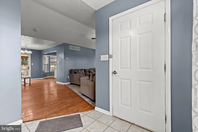 a big room with closet and mirror