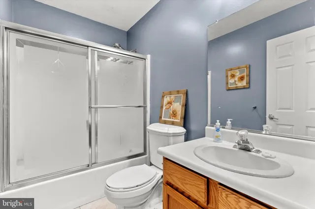 a bed room with a bed and a chandelier