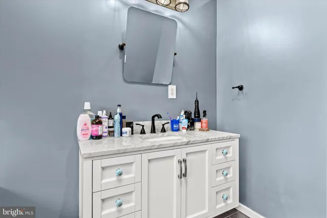 a bathroom with a sink and a bathtub