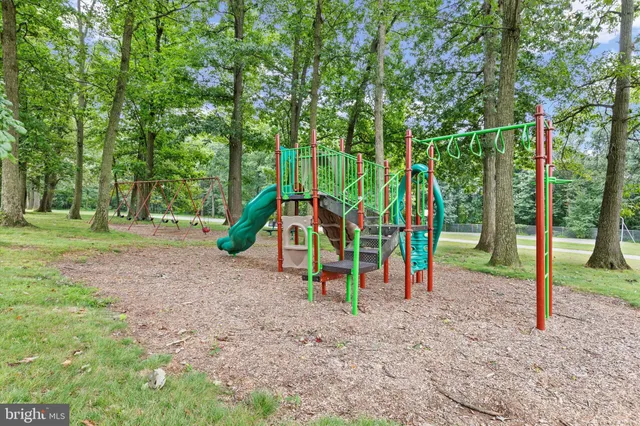 a view of park with swings