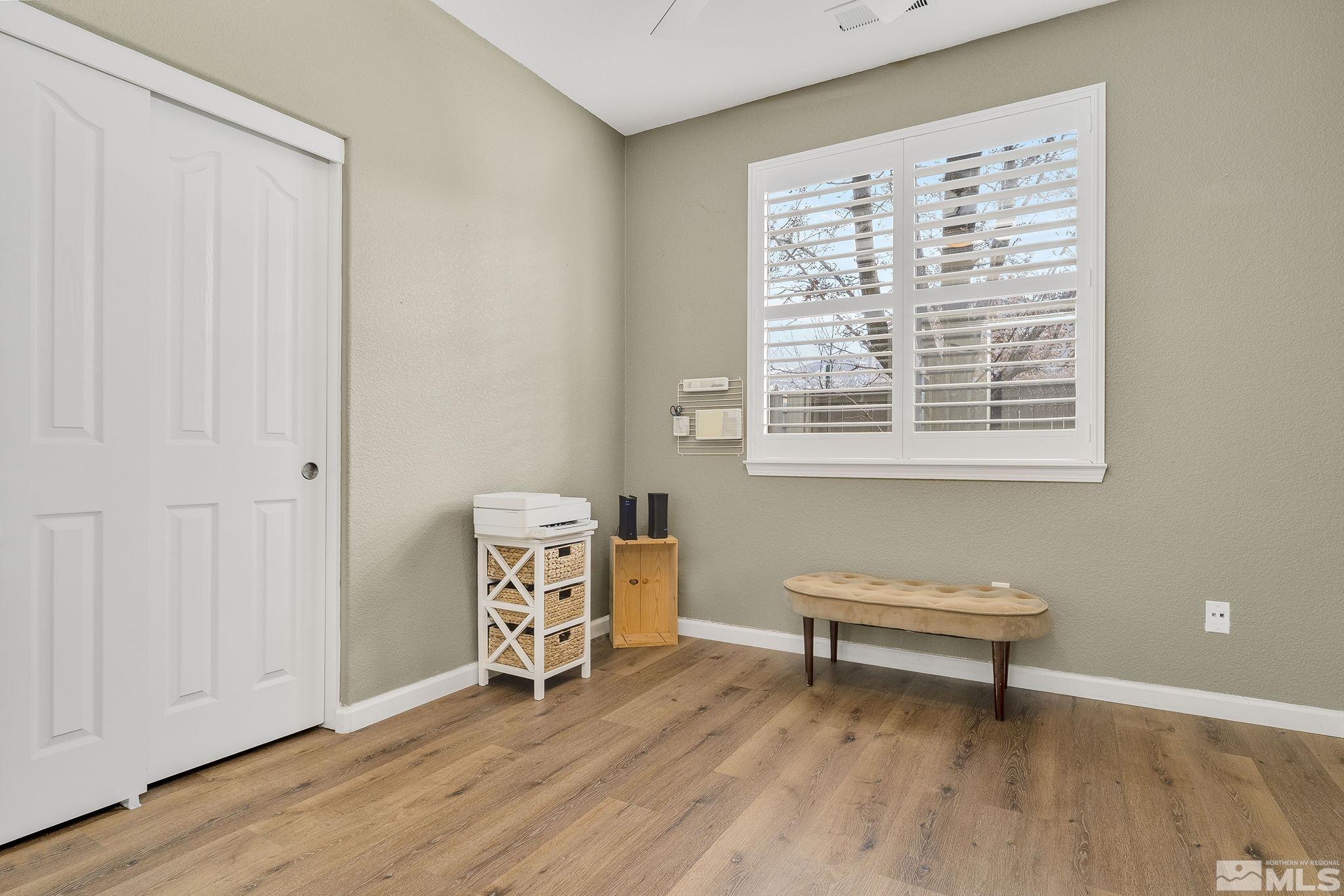 495 Dartmoor Court Reno, NV 89521 - Photo 15 of 22 a living room with furniture and a window
