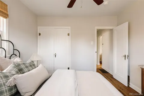 a bedroom with a bed and furniture
