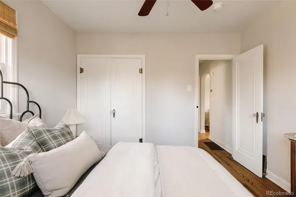 a bedroom with a bed and furniture